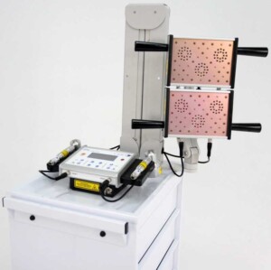 5-drawer cart with LZR7™ ZX2 high power laser controller system with smaller example probes on either side, plus 1.8 Million milliWatt Cool Class 3B Area Laser at the end of an adjustable arm (shown in collapsed position, revealing under side of area laser probe with 4 handles)